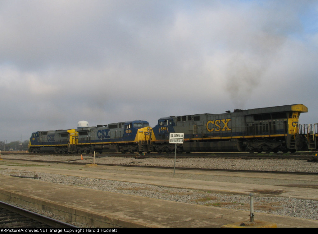 Three different GE models lead a train southbound